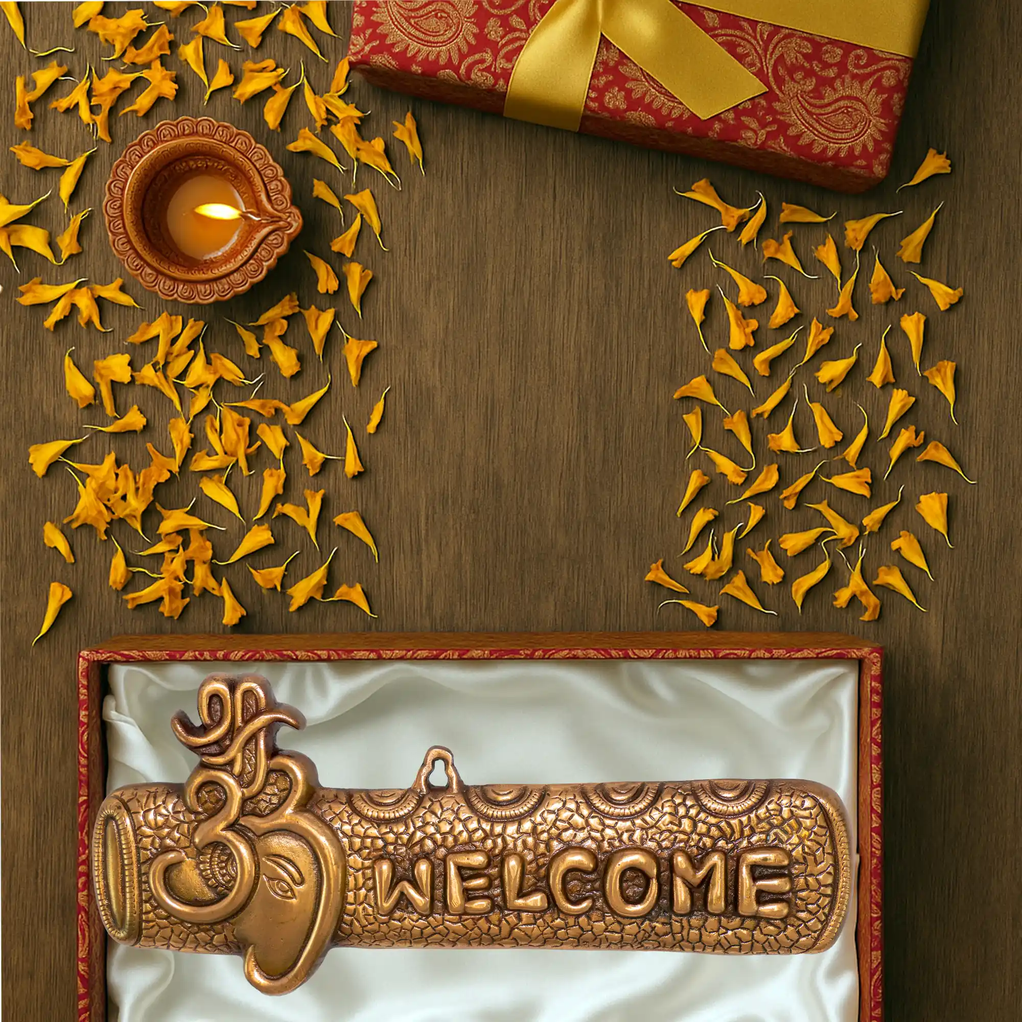 Close-up of Ganesha metal welcome plate showing engraved texture